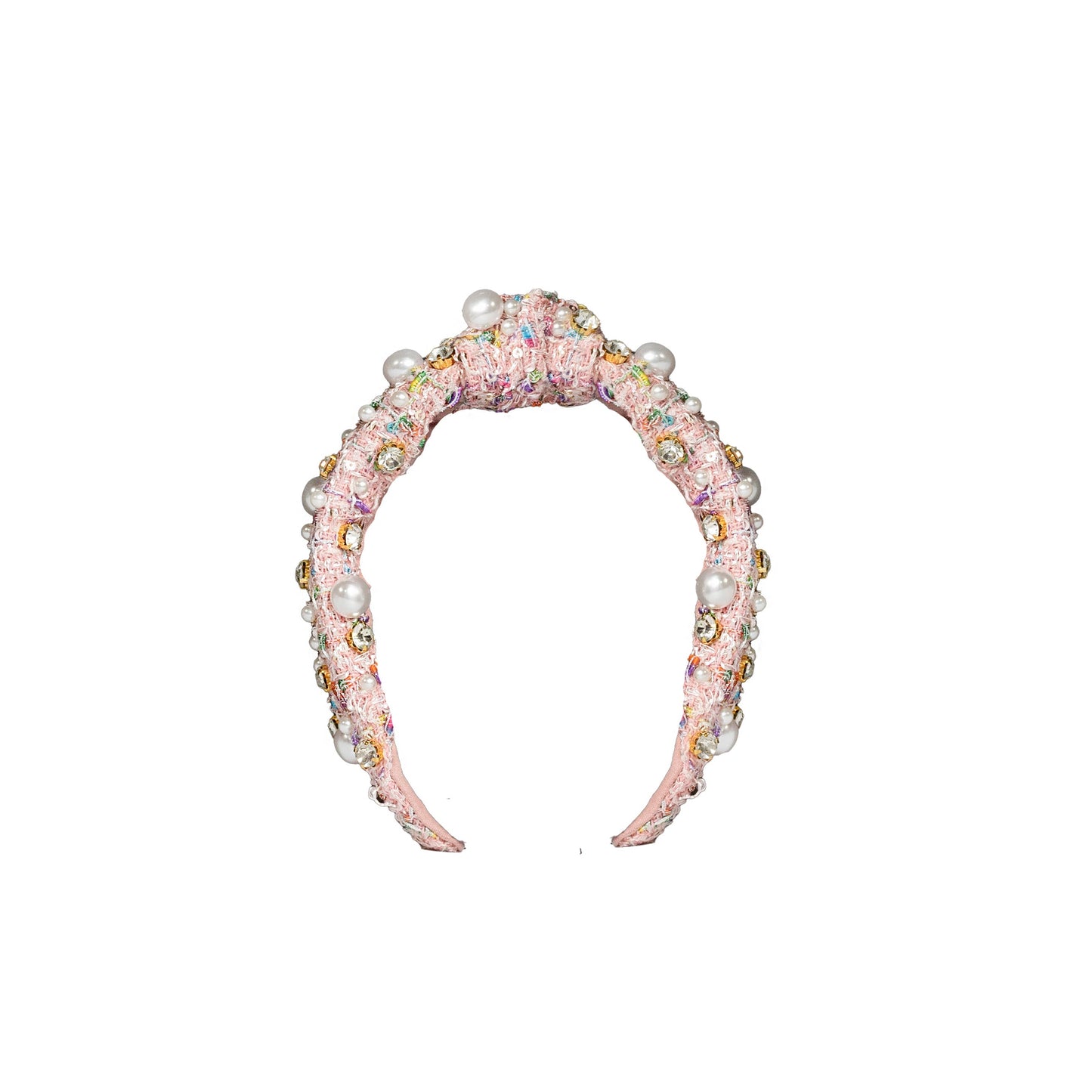 Decorative headband with pearls and crystals on a white background